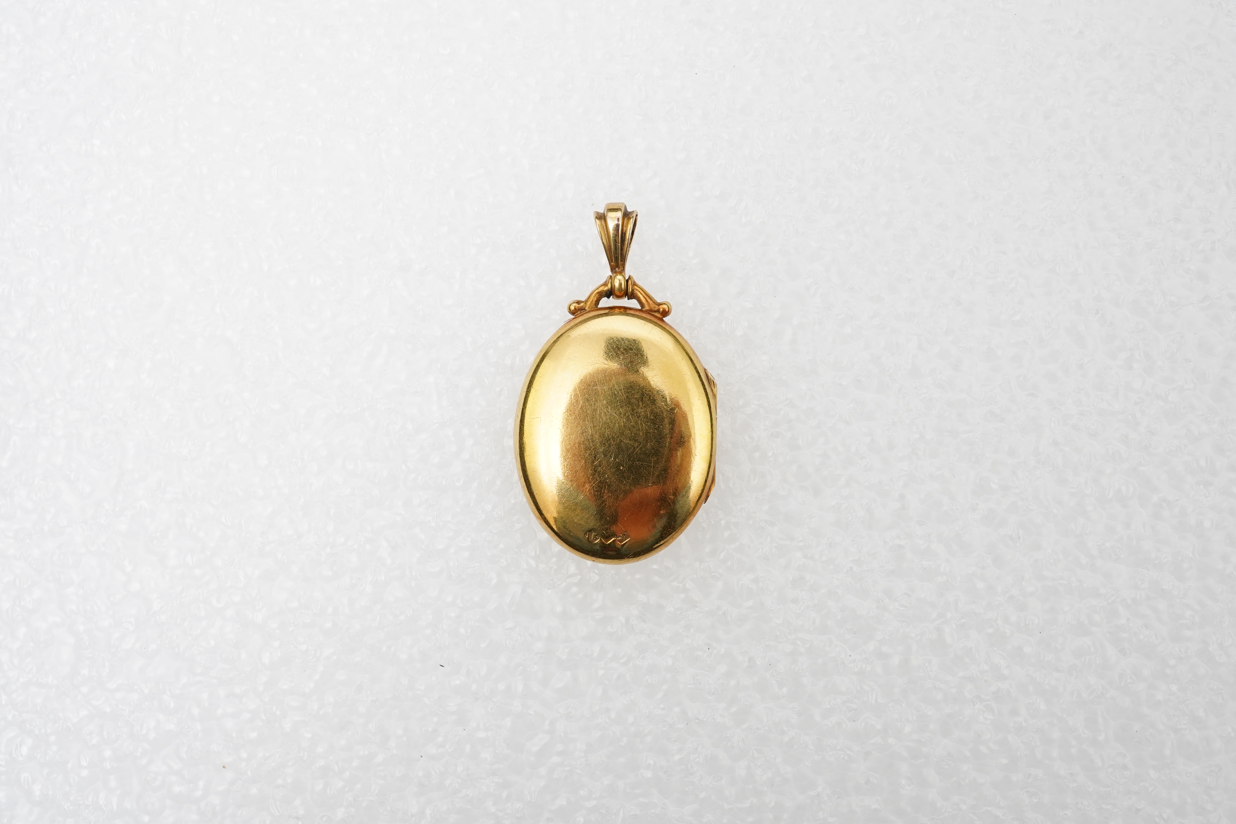An Edwardian gold locket, early 20th century